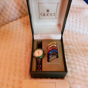 Vintage Gucci interchangeable watch with 6 bezels